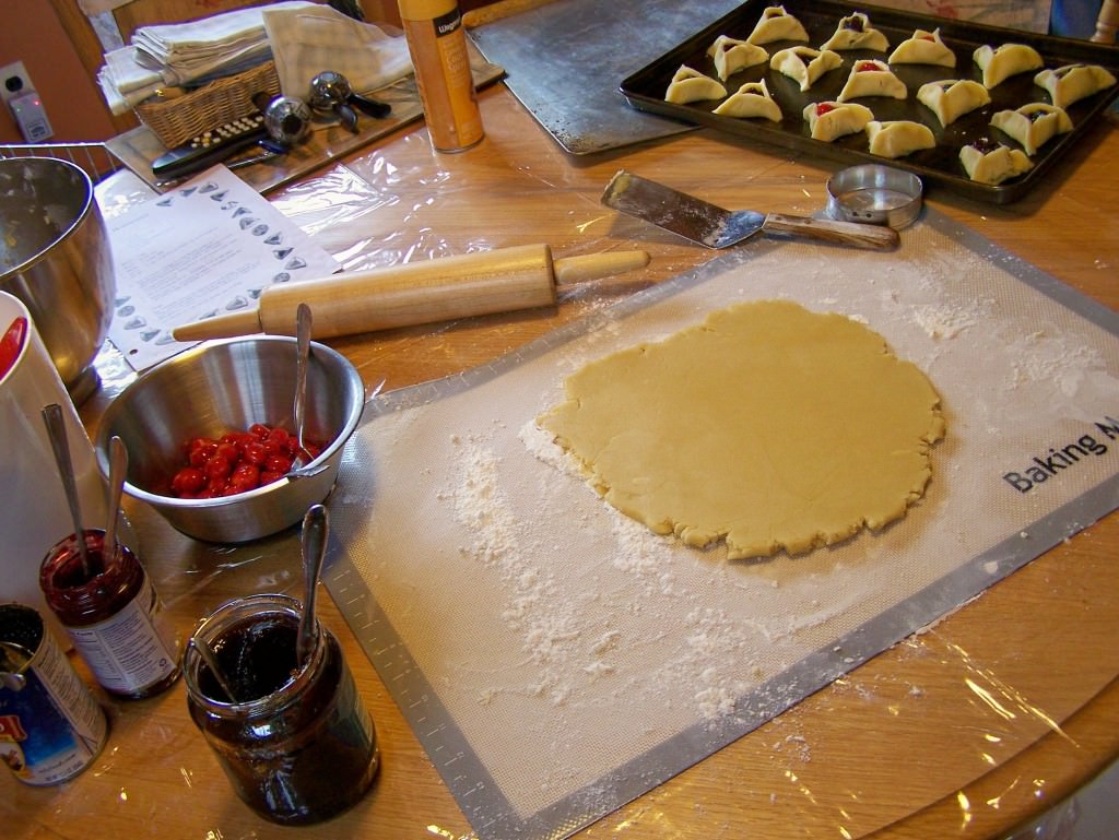 Hamentashen-rolling; photo by L. Goldman Hamentashen-rolling; photo by L. Goldman