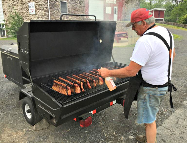 Oink Johnson's BBQ_Jack making ribs