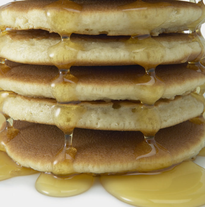 Stack of Pancakes with Syrup --- Image by © Royalty-Free/Corbis