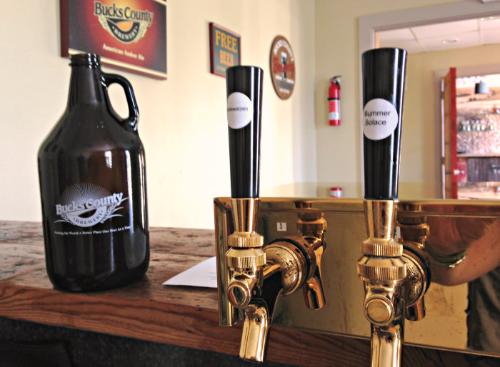BC Brewery taps & growler; photo credit Lynne Goldman
