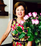 Martine Bertin-Peterson with flowers