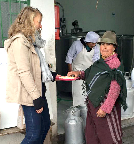 Villager tasting finished chocolate. Photo courtesy Pierre's Chocolates